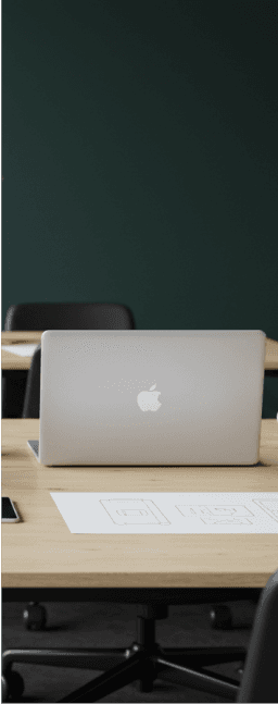Laptop on wooden desk